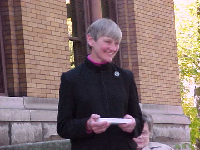 Margaret Thomson on steps 
of the Andrew Carnegie Free Library