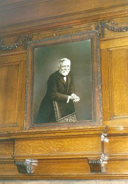 Portrait of Andrew Carnegie hanging over
fireplace in Andrew Carnegie Free Library, Carnegie, Pa.